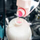 close up photo of mechanic changing antifreeze flu 2025 03 08 13 09 02 utc 80x80